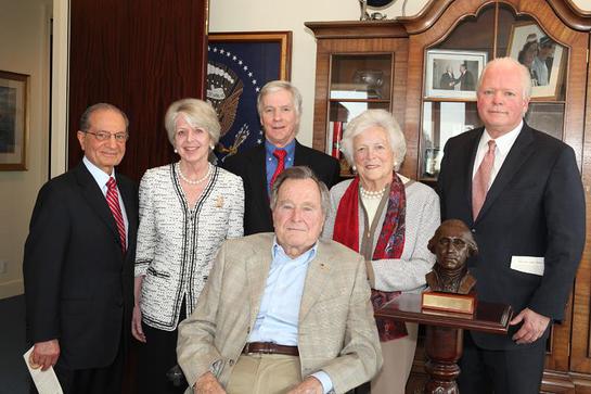 From left to right: Cyrus A. Ansary; Barbara Lucas; Ryan C. Crocker; President H.W. Bush; Barbara Bush; Curt Viebranz.