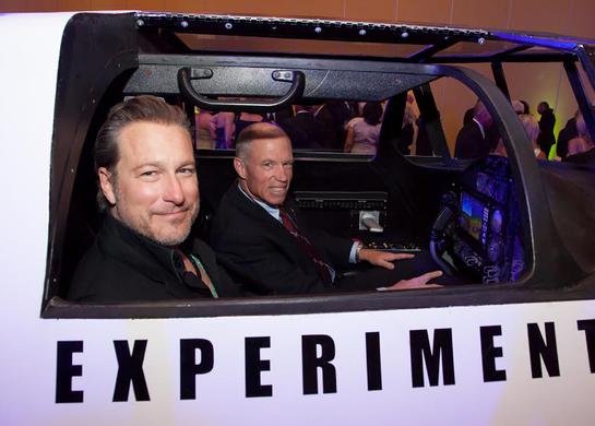 John Corbett and XCOR Chief Test Pilot Richard Searfoss climb aboard the Lynx replica at Celebrity Fight Night XX on Saturday, April 12th in Phoenix, Arizona