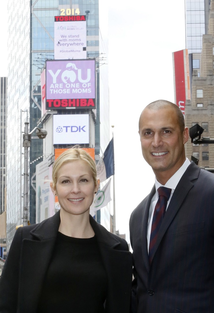 Kelly Rutherford and Nigel Barker stand in New York's Times Square before the new video for the Global Moms Relay,