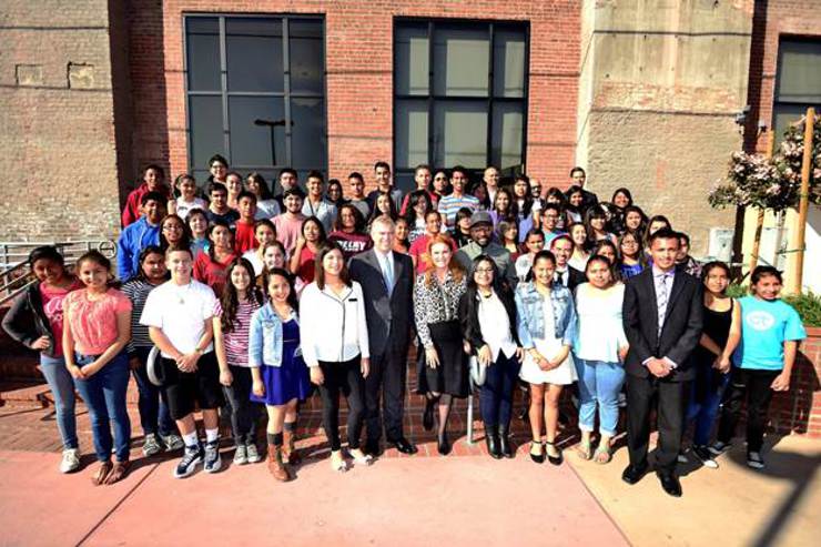 After a class assembly, The Duke of York, Sarah Ferguson, Duchess of Yorkand i.am.angel Foundation President, will.i.am, join students from the i.am College Track Boyle Heights program for a group photo.