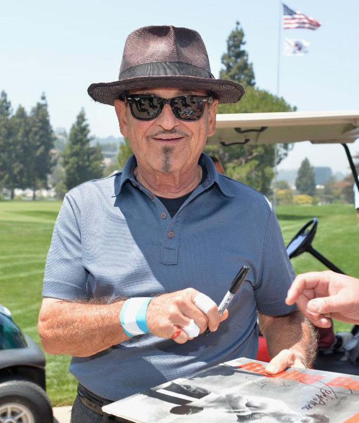 Joe Pesci signing memorabilia for the social media prizes