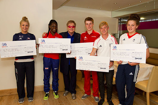 Elton John with the first SportsAid athletes to benefit from the Elton John Sports Fund