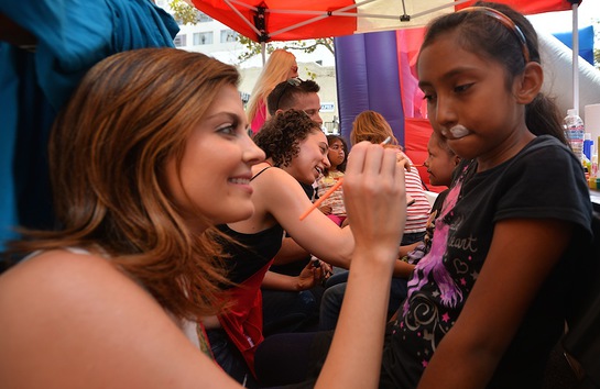 Jen Lilley paints children's faces as part of the Los Angeles Mission End of Summer Block Party Jen Lilley paints children's faces as part of the Los Angeles Mission End of Summer Block Party