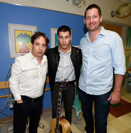 Charlie Walk EVP of Republic Records, Nick Jonas and Pete Griffin President of Musicians on Call