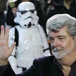 George Lucas Signs Guitar For Charity Gala