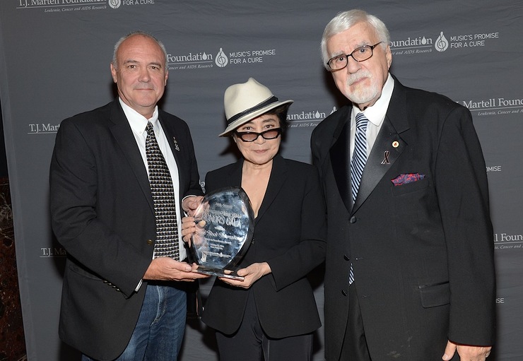 Hard Rock International President and CEO Hamish Dodds accepts the Spirit of Excellence Award from Yoko Ono Lennon