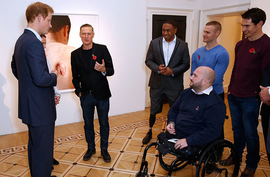 Prince Harry and Bryan Adams at the Wounded: The Legacy of War photographic exhibition