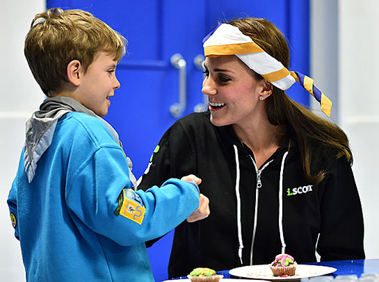 The Duchess of Cambridge dons a blindfold during a session to teach children what it is like to live with a disability