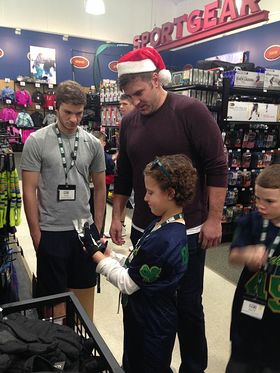 Todd Herremans with kids at DICK'S Sporting Goods