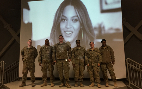 Troops stationed at Bagram Airfield in Afghanistan pose for a photo on New Year's Eve