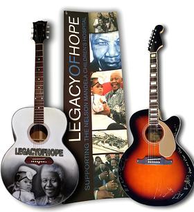 U2 signed guitar alongside trademark Legacy of Hope Campaign Guitar U2 signed guitar alongside trademark Legacy of Hope Campaign Guitar