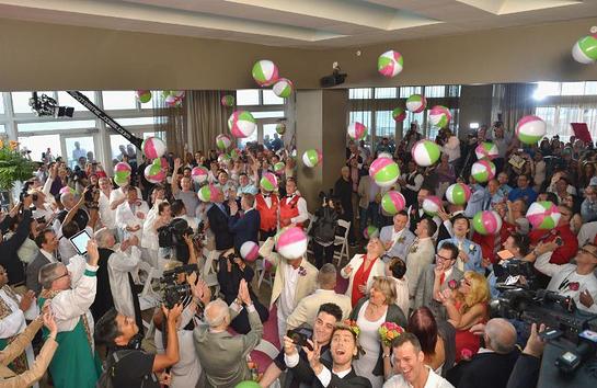 LGBT and straight couples say they do at the W Fort Lauderdale in a historic group wedding ceremony