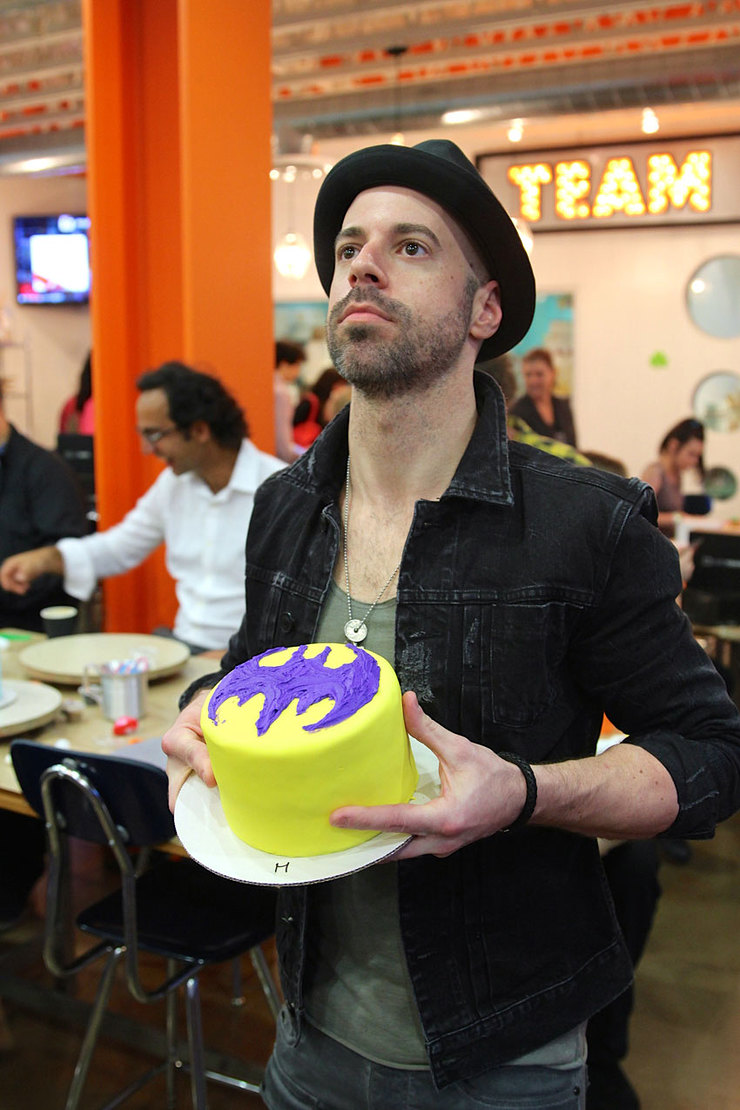 Chris Daughtry with a Batman cake that he decorated