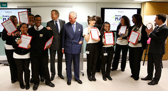 Prince of Wales with CEO of Marks and Spencer, Marc Bolland, and newly employed Prince's Trust 'Make your Mark' participants