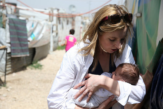 Laura cradles two-month-old baby born in Houch El-Oumara