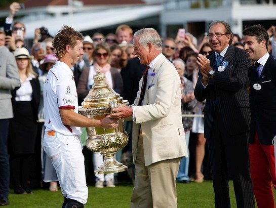 Prince Charles, Prince of Wales awards The Royal Salute Coronation Cup to James Beim of England