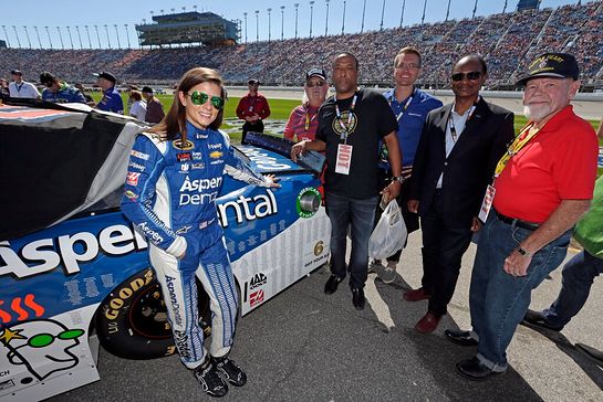 From left: NASCAR driver Danica Patrick, veteran Randall Murray, veteran Stephen Leon, Aspen Dental dentist Dr. Jere Gillan, veteran Robert L. Gordon, president of Got Your 6's parent organization Be The Change, Inc, and veteran Peter Bouley.